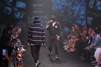 Mumbai: Actor Ranveer Singh and rapper Naezy perform during Gully Gen