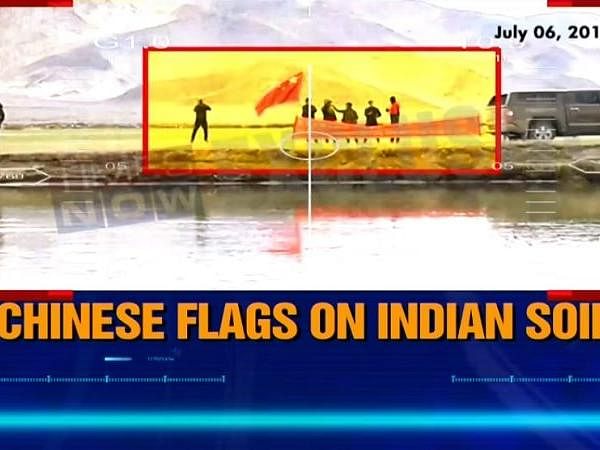 Two reports say PLA soldiers entered when Tibetans hoisted their flag, while one says they didn’t infiltrate at all.