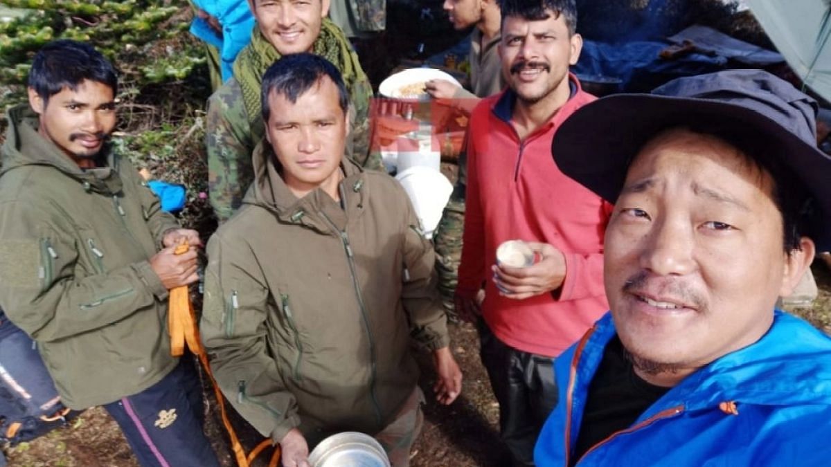 Taka Tamut (extreme right) with other members of the search and rescue team in Arunachal Pradesh.