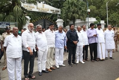 Bengaluru: Eight Congress and three Janata Dal-Secular (JD-S) legislators arrive at Raj Bhawan to submit their resignations to the Governor, in Bengaluru on July 6, 2019. (Photo: IANS)