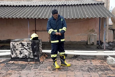 Chennai: A firefighter at the Harbour Telephone Exchange of the Bharat Sanchar Nigam Ltd (BSNL) where a fire broke out affecting mobile, landline and broadband connectivity in the area, in Chennai on Aug 1, 2019. (Photo: IANS)