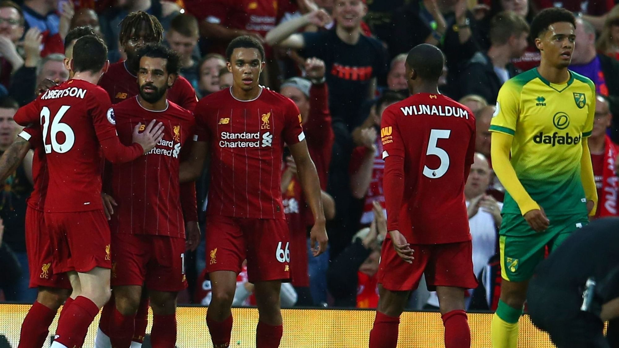 Liverpool opened its bid to end a 30-year English title drought by beating Premier League newcomer Norwich 4-1.
