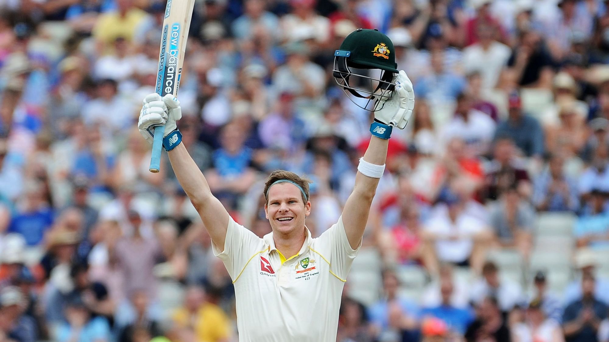 Australia’s Steven Smith celebrates a century during day four of the first Ashes Test cricket match between England and Australia at Edgbaston in Birmingham.