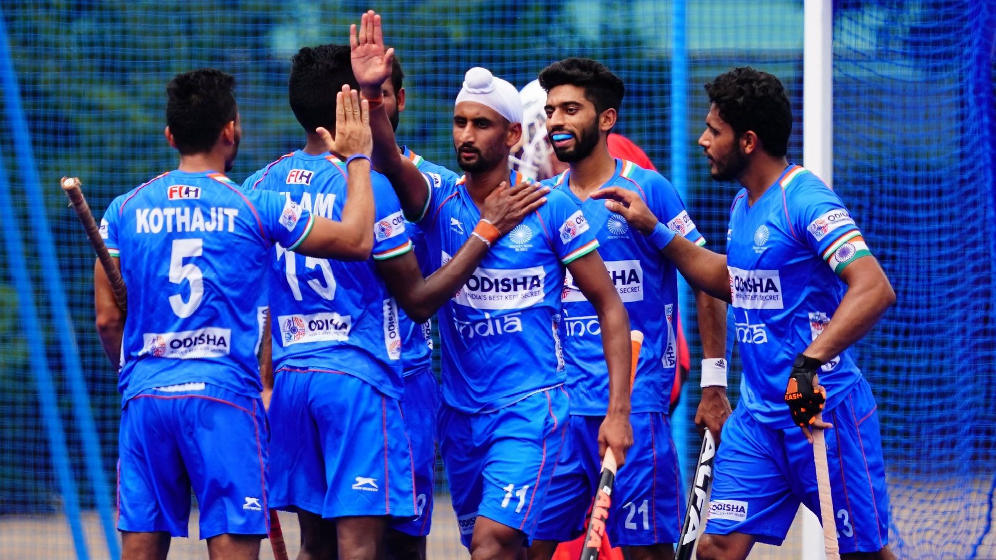 The Indian team celebrating one of their goals against New Zealand in the final.
