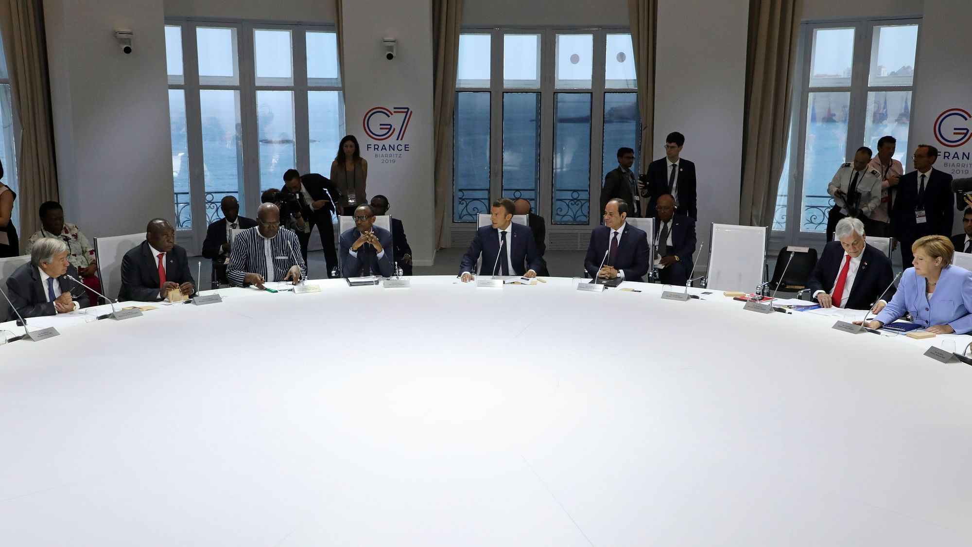 Trump left an empty chair as global power brokers debated Monday how to help the fire-stricken Amazon and reduce carbon emissions.