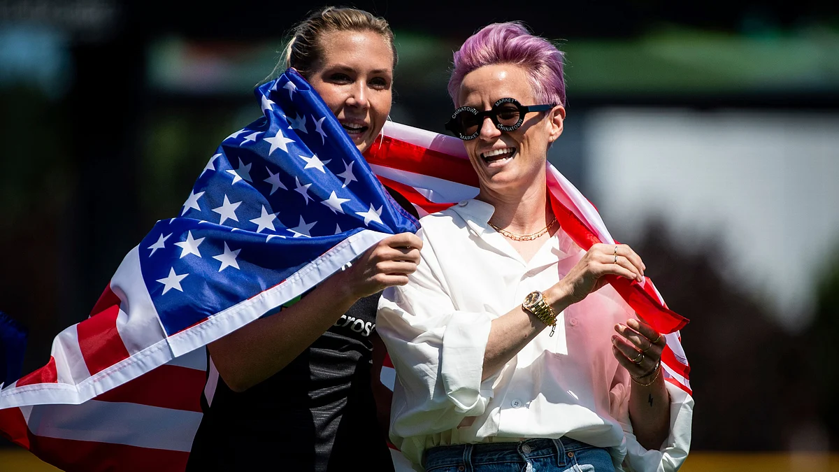 File picture of Reign FC midfielder Allie Long (left) and forward Megan Rapinoe