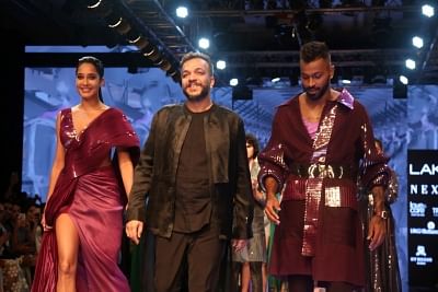 Mumbai: Actress Lisa Haydon and Hardik Pandya showcase creations of fashion designer Amit Aggarwal at the Lakme Fashion Week Winter/Festive 2019 in Mumbai on Aug 21, 2019. (Photo: IANS)