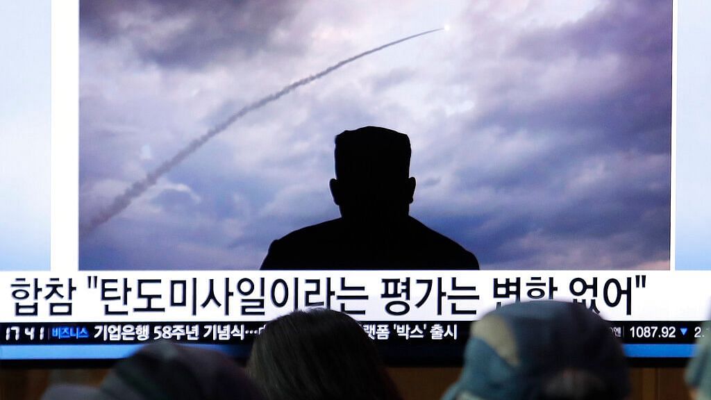 People watch TV showing an image of North Korea’s multiple rocket launch during a news program at the Seoul Railway Station in South Korea on 1 Aug 2019. &nbsp;