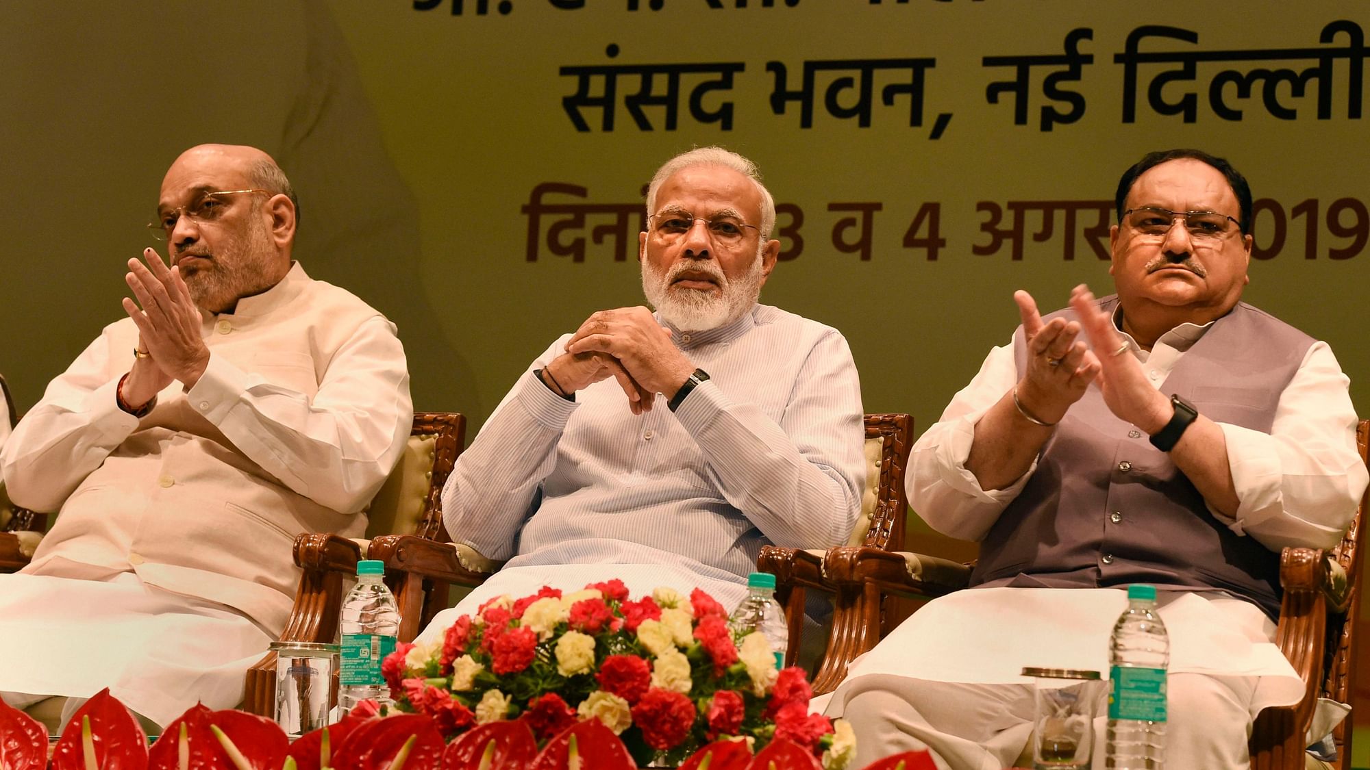 <div class="paragraphs"><p>A file photo of Prime Minister Narendra Modi (center) with Union Home Minister Amit Shah (left) and party chief JP Nadda (right).</p></div>