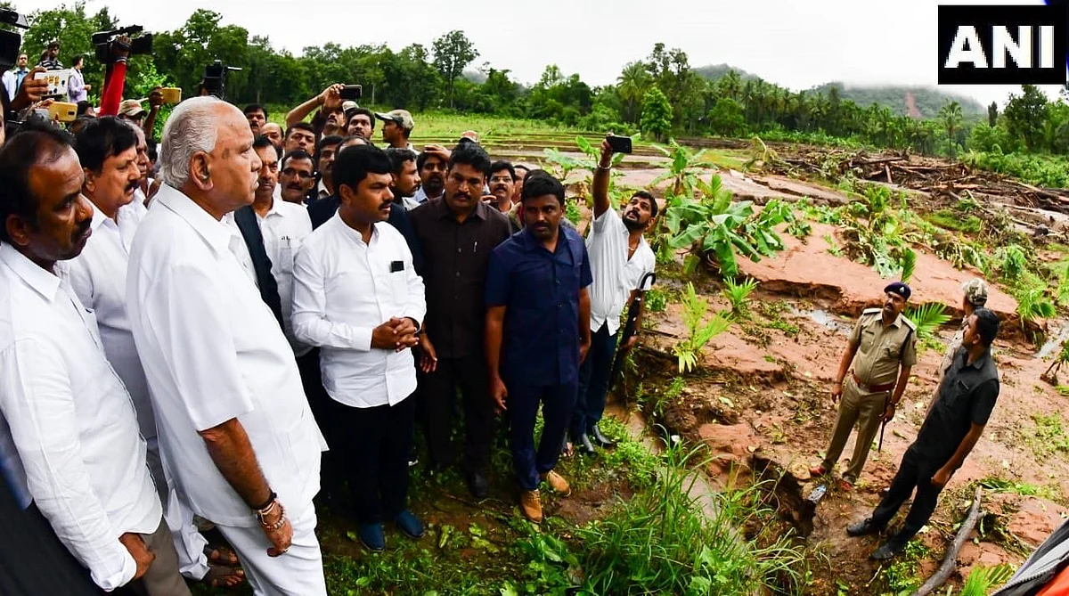 Karnataka CM BS Yediyurappa reviews a landslide in Karnataka’s Shivamogga.
