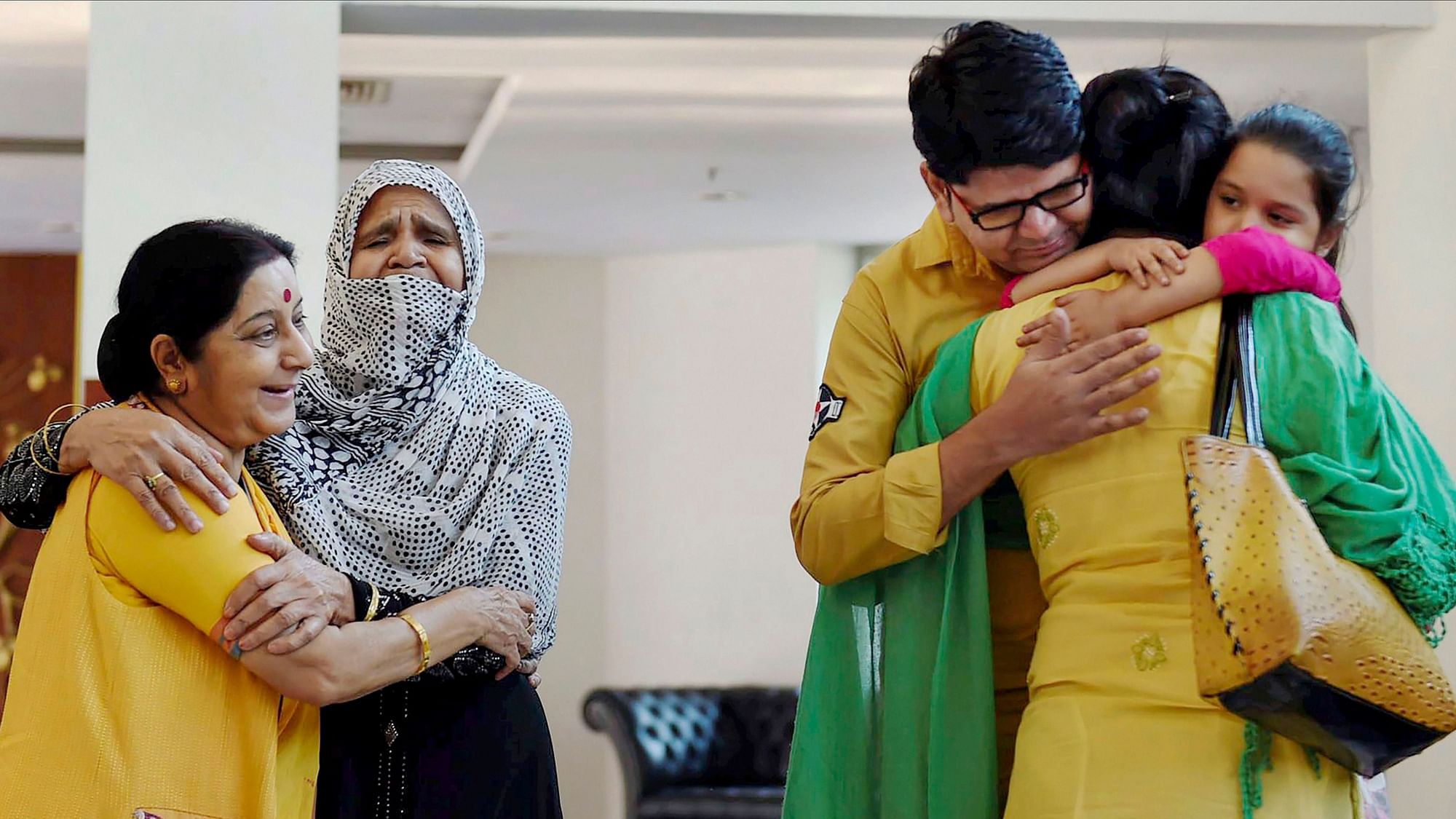  In this 25 May 2017 file photo, Sushma Swaraj is seen with Uzma Ahmed as she gets emotional while uniting with her family during a press conference at Jawahar Bhawan in New Delhi.