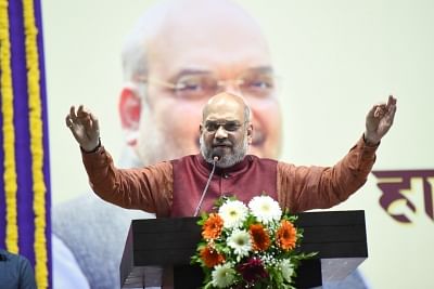 Taleigao (Goa): BJP chief Amit Shah addresses during a party programme at Dr Shyama Prasad Mukherjee Indoor Stadium in Taleigao, Goa on May 13, 2018. (Photo: IANS)