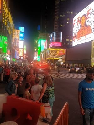 New York: People running for safety after hearing a loud bang  on the Times Sqauare, New York on Aug, 6, 2019. (Photo: IANS)