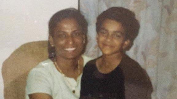 In the picture, a young PV Sindhu can be seen sitting on PT Usha’s lap
