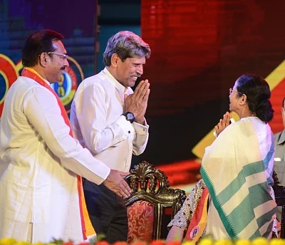 Kolkata: West Bengal Chief Minister Mamata Banerjee and former cricketer Kapil Dev during the 100th Anniversary celebrations of East Bengal Club, in Kolkata on Aug 1, 2019. (Photo: IANS)