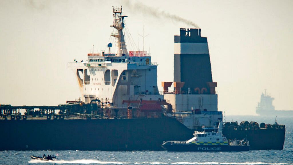 In this Thursday, July 4, 2019 file photo, a Royal Marine patrol vessel is seen beside the Grace 1 super tanker in the British territory of Gibraltar.