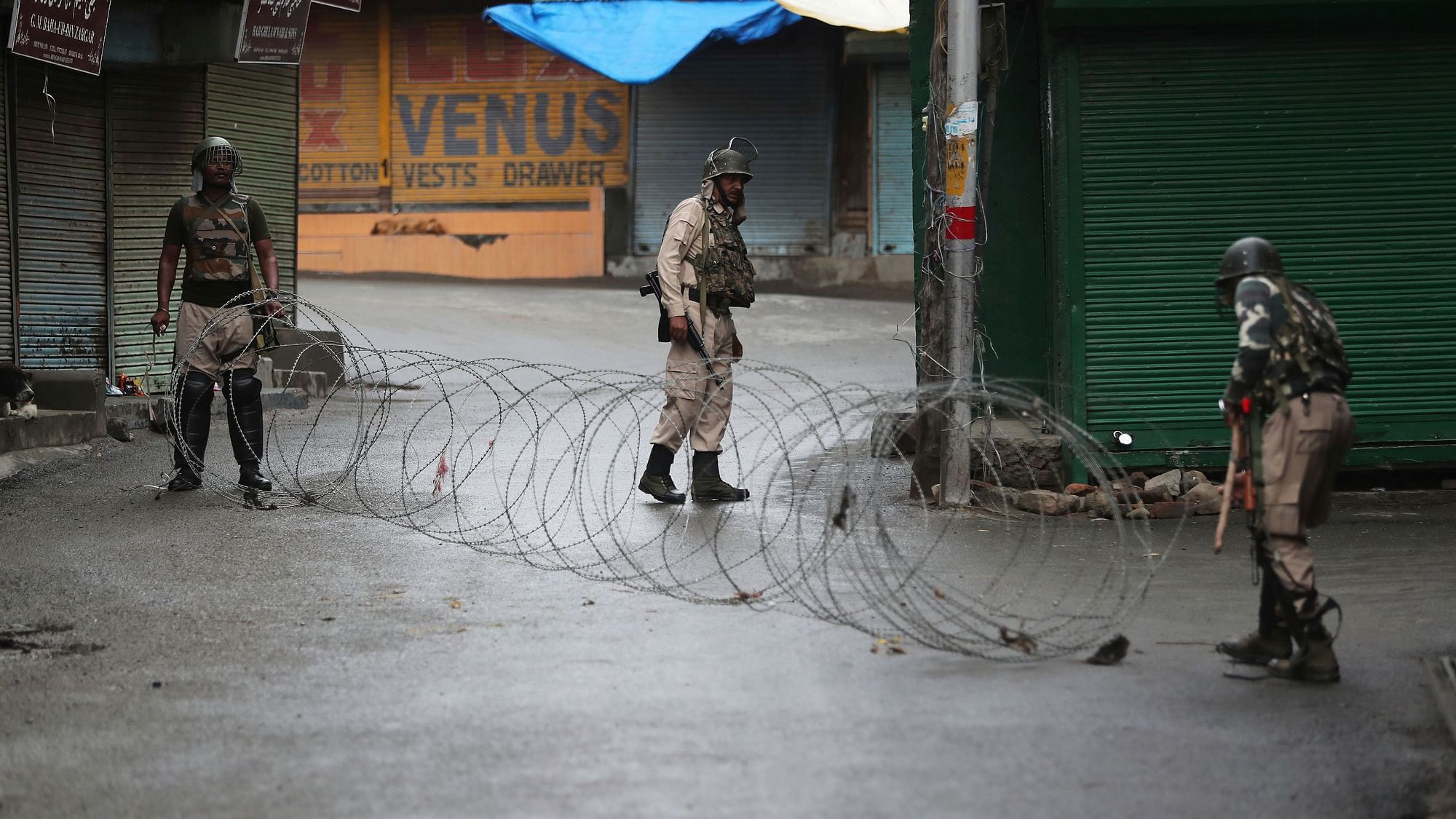 Indian paramilitary soldiers close a street using barbwire in Srinagar, J&amp;K. (Image used for representational purposes only)