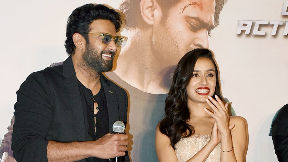 Prabhas and Shraddha Kapoor at the trailer launch of their film <i>Saaho</i>.&nbsp;