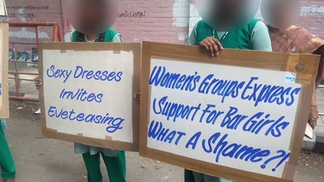 ‘Sexy dresses invite eve-teasing,’ read one of the posters. 