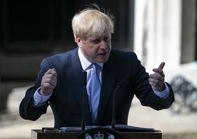 LONDON, July 24, 2019 (Xinhua) -- Newly elected Conservative Party leader and British Prime Minister Boris Johnson speaks at 10 Downing Street in London, Britain, July 24, 2019. Newly-elected Conservative Party leader Boris Johnson took office as the British prime minister on Wednesday amid the rising uncertainties of Brexit. The latest development came after Theresa May formally stepped down as the leader of the country and Johnson was invited by the Queen to form the government. (Xinhua/Han Ya