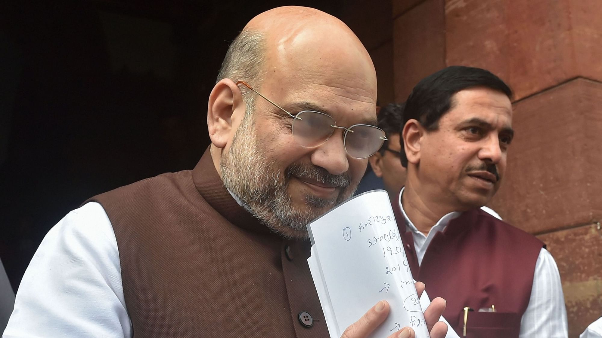 Union Home Minister Amit Shah at Parliament House on Monday, 5 August. Shah moved statutory resolutions in the Rajya Sabha to revoke Article 370 in Jammu &amp; Kashmir.
