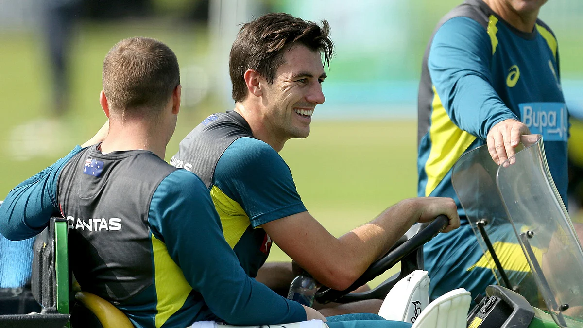 Australia’s Pat Cummins reacts, during a nets session. 