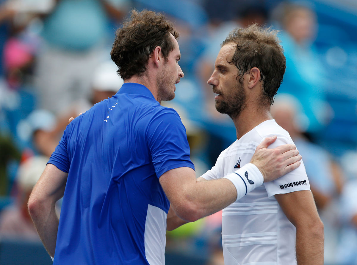 Andy Murray lost his first singles match after his hip surgery to Richard Gasquet at the Western & Southern Open.