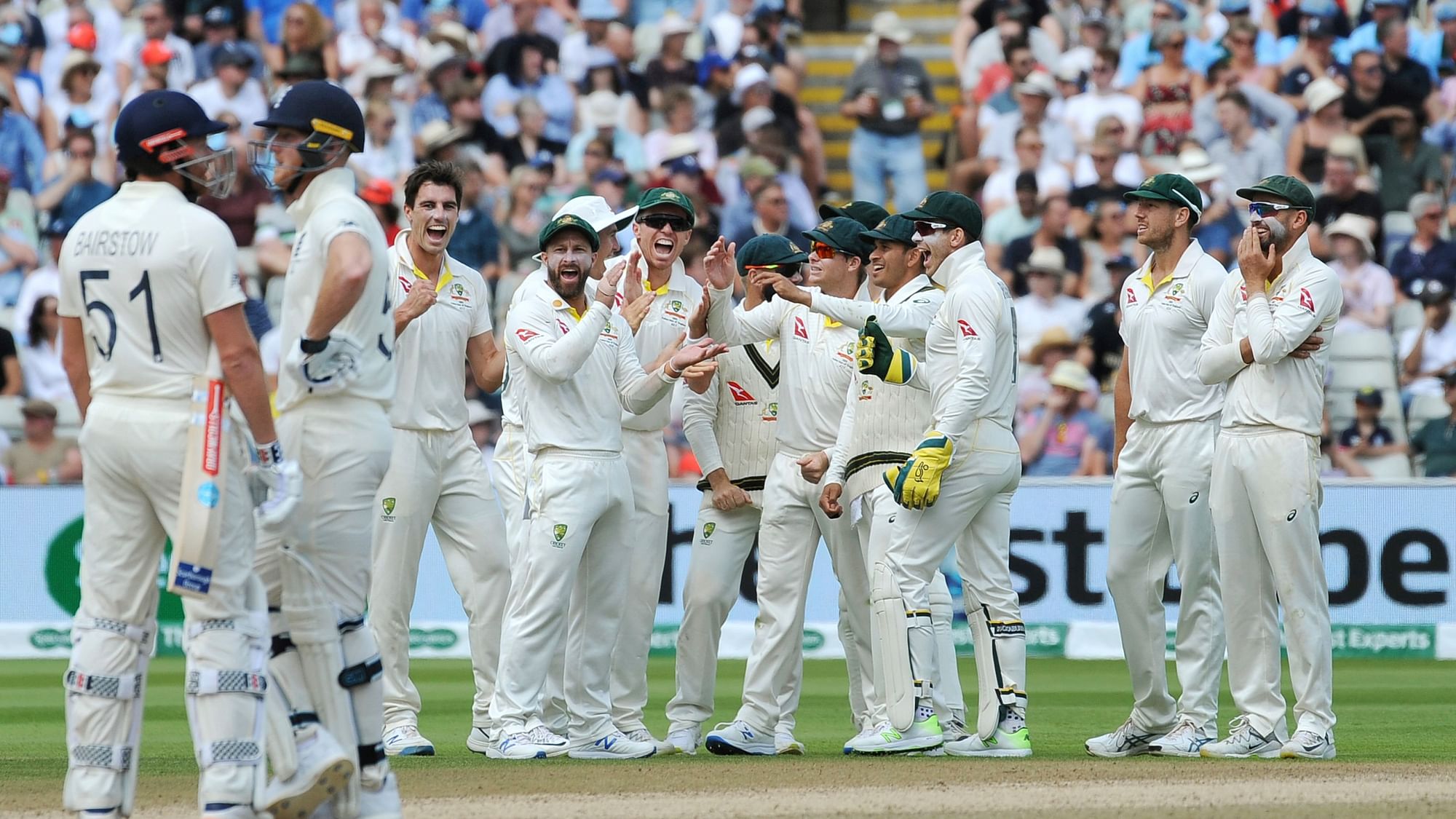 Australia players celebrate after a review confirms the dismissal of England’s Jonny Bairstow during day five of the first Ashes Test cricket match between England and Australia at Edgbaston in Birmingham, England, Monday Aug. 5, 2019.