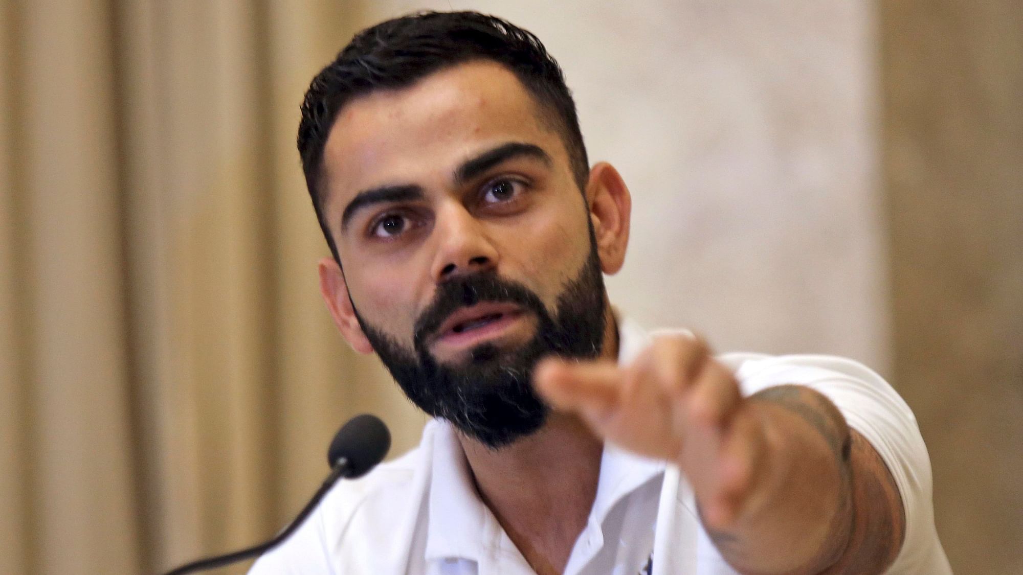 Indian captain Virat Kohli at a press conference before leaving for the US.