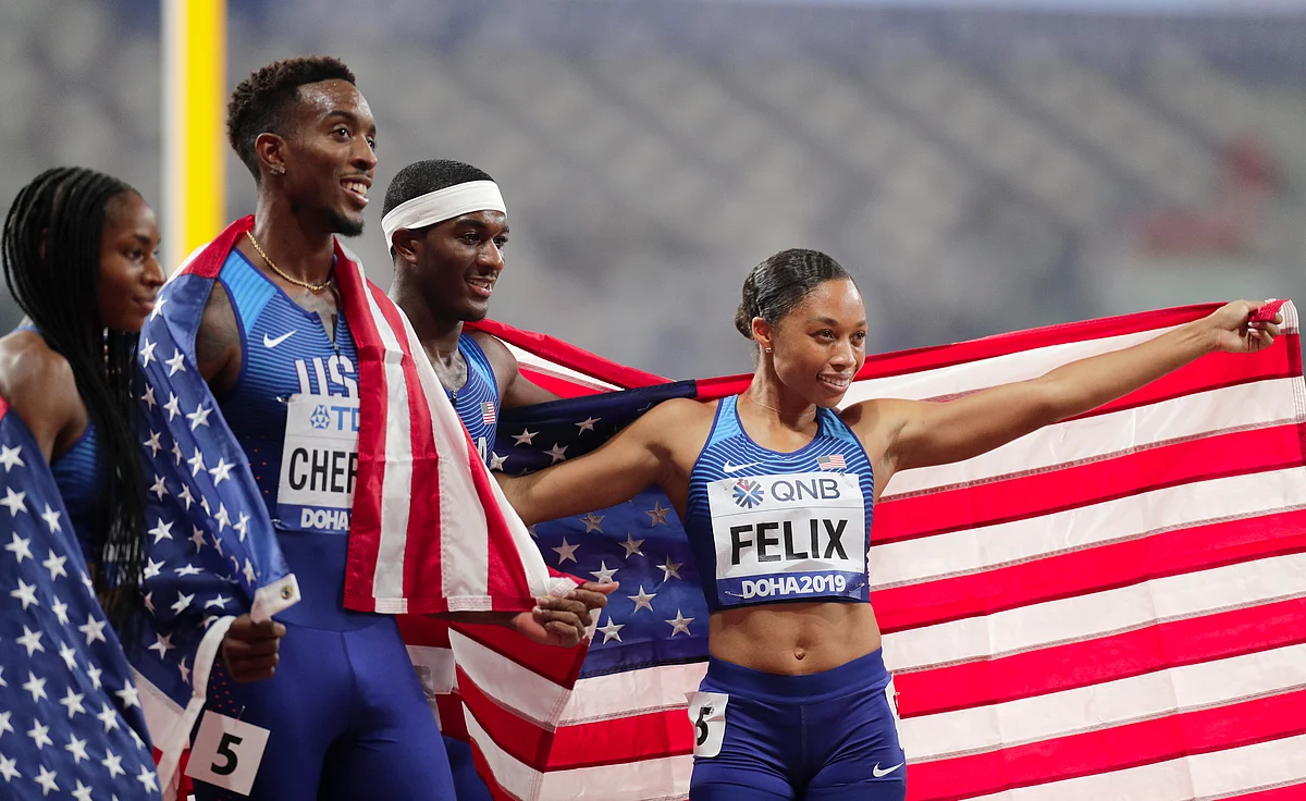 The United States team of Allyson Felix, Wilbert London, Michael Cherry and Courtney Okolo after winning the gold medal in the mixed 4x400 meter relay race at the World Athletics Championships.