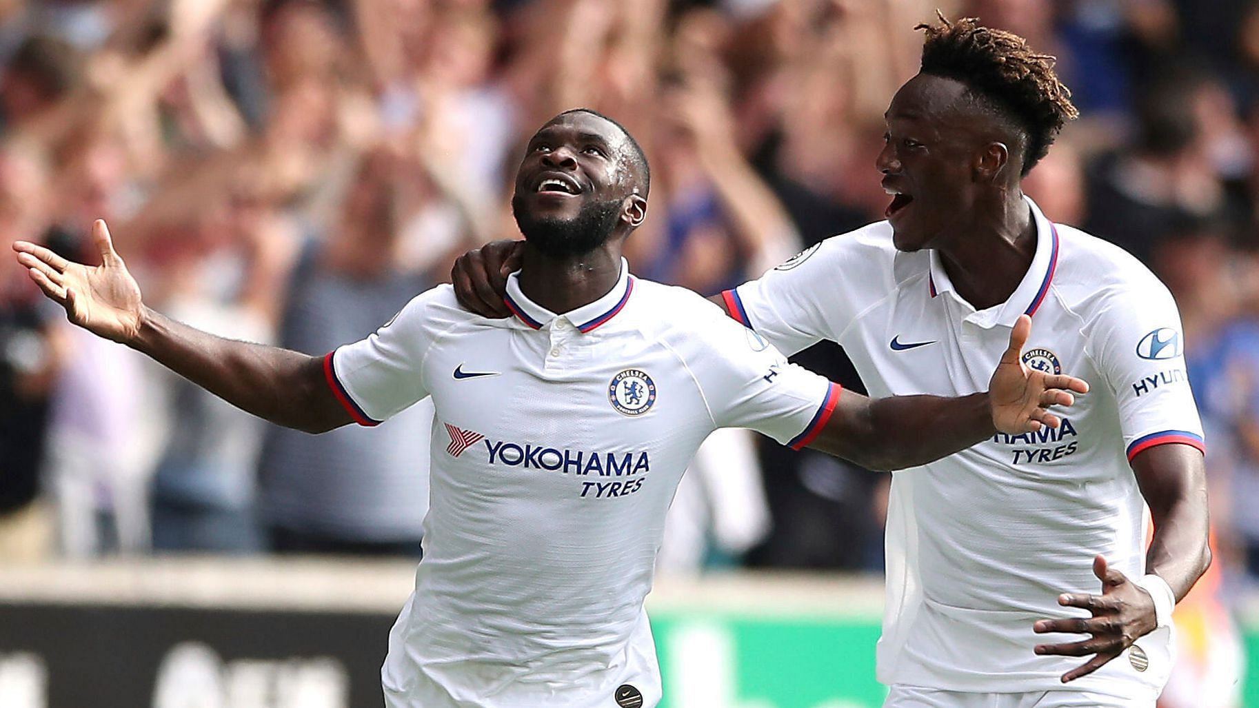 Chelsea’s Fikayo Tomori, left, celebrates scoring his side’s first goal of the game with teammate Tammy Abraham during their English Premier League soccer match.