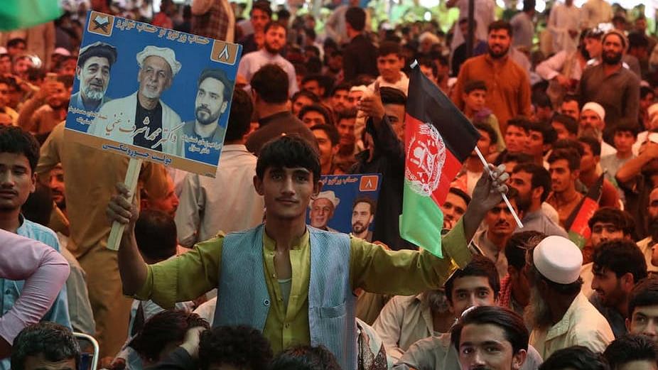 Supporters of incumbent Ashraf Ghani at a rally in Kabul ahead of elections on 28 September.<a href="mailto:?subject=Afghanistan%3A%20failure%20of%20US-Taliban%20peace%20talks%20looms%20over%20elections%20%E2%80%94%20The%20Conversation&amp;body=Hi.%20I%20found%20an%20article%20that%20you%20might%20like%3A%20%22Afghanistan%3A%20failure%20of%20US-Taliban%20peace%20talks%20looms%20over%20elections%22%20%E2%80%94%20http%3A%2F%2Ftheconversation.com%2Fafghanistan-failure-of-us-taliban-peace-talks-looms-over-elections-123713"><i><br></i></a>