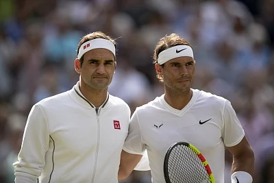 Roger Federer (L) of Switzerland and Rafael Nadal of Spain. (Xinhua/Han Yan/IANS)