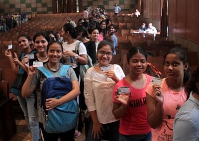 New Delhi: Students queue up with their identity cards to cast their votes for the Delhi University Students Union (DUSU) elections, at Miranda House College in North Campus, in New Delhi on Sep 12, 2019. (Photo: IANS)