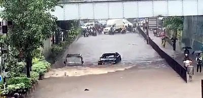 Amid heavy rain that has disrupted normal life here, with people posting pictures and videos on the citys flooded roads, a video has gone viral showing a Jaguar is stranded in a flooded underpass at Airoli in Navi Mumbai, but an Indian-made SUV Bolero zips past despite the flooding and gets to the other side of the road without any incident.