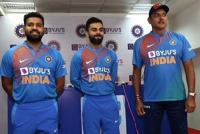 Dharamsala: Indian Head coach Ravi Shastri and cricketers Rohit Sharma and Virat Kohli showcase the team