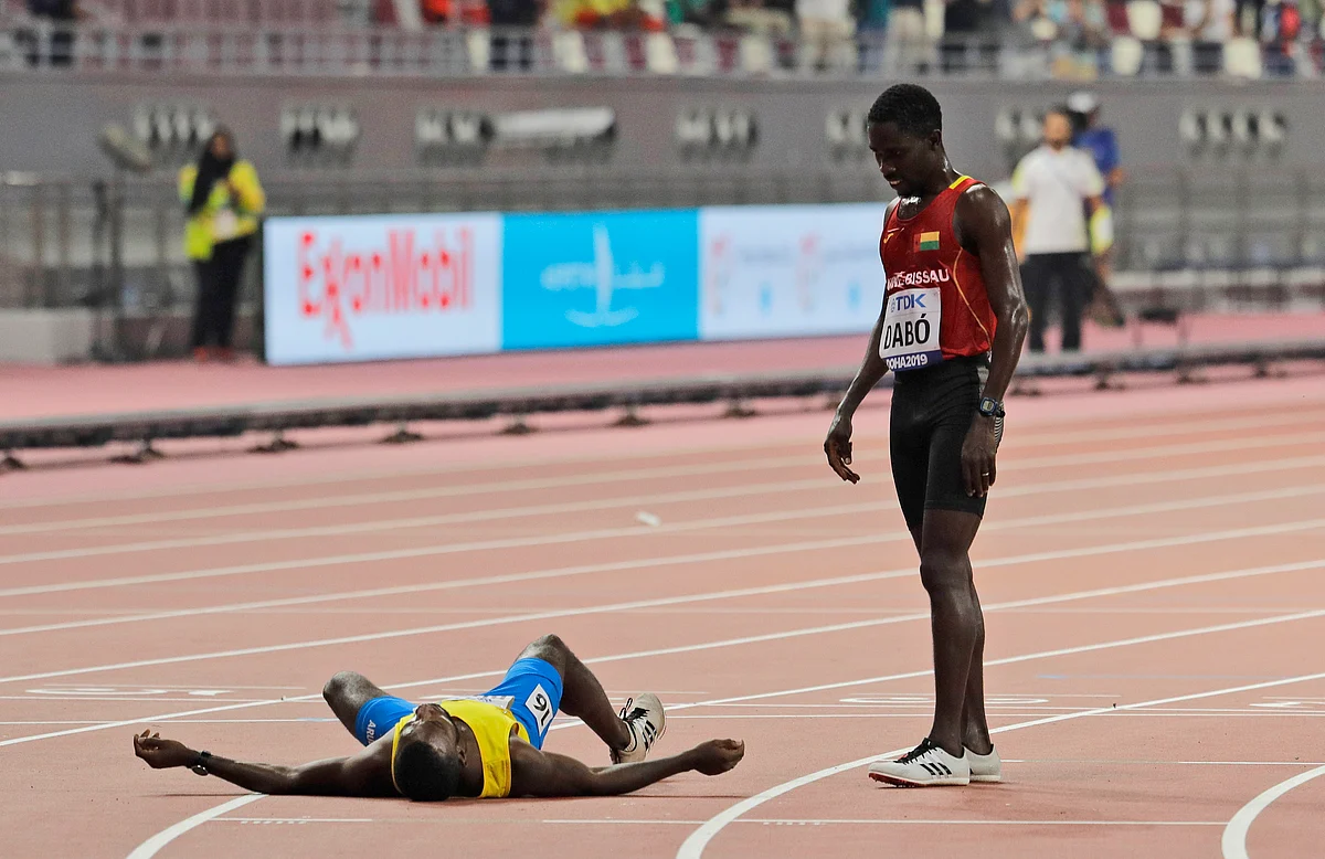 Aruba’s Jonathan Busby leaves in a wheelchair after a men’s 5000m heat at the World Athletics Championships in Doha, Qatar, Friday, Sept. 27, 2019. 