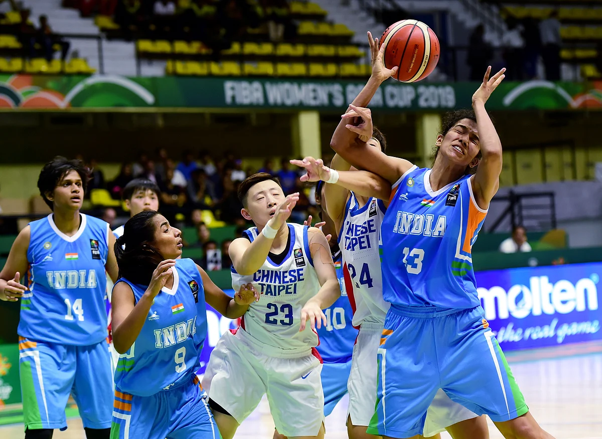 India's Jeena Skaria and Chinese Taipeis Szu Chin Peng in action during the FIBA Womens Asia Cup 2019 league match at Kanteerava Stadium in Bengaluru, Thursday, 26 September.