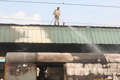 New Delhi: Firefighting operations underway at the New Delhi railway station where a fire broke out in the rear power car of the Chandigarh-Kochuvalli Express, on Sep 6, 2019. No one was injured in the incident that took place at 1.40 p.m. at platform No. 8. (Photo: IANS)