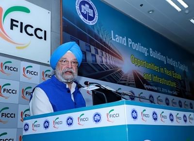 New Delhi: Union MoS Housing and Urban Affairs, Civil Aviation (Independent Charge) and Commerce and Industry Hardeep Singh Puri addresses at the Conference on "Land Pooling: Building India