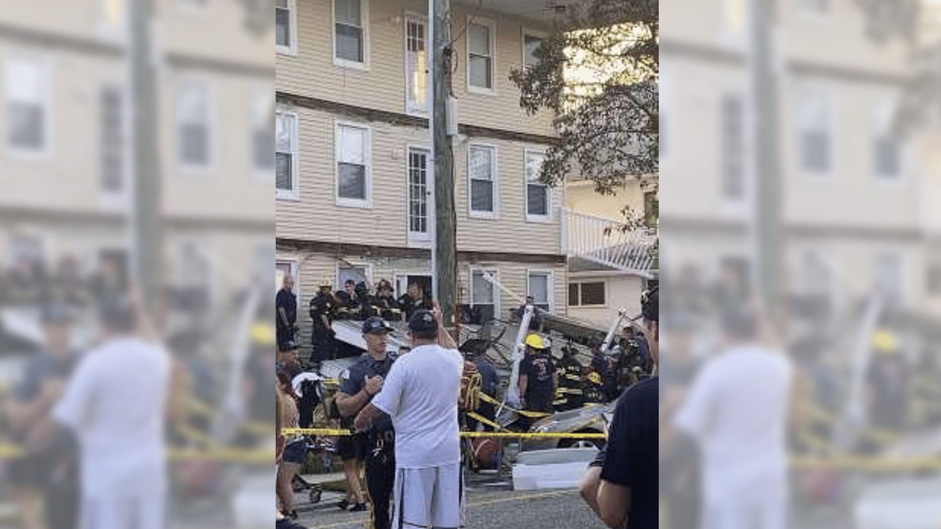 In this photo provided by James Macheda, first responders work the scene of a building structure damage in Wildwood, New Jersey, on Saturday, 14 September 2019. Multiple levels of decking attached to a building collapsed Saturday evening at the Jersey Shore, trapping people and injuring several, including children, officials and witnesses said.&nbsp;