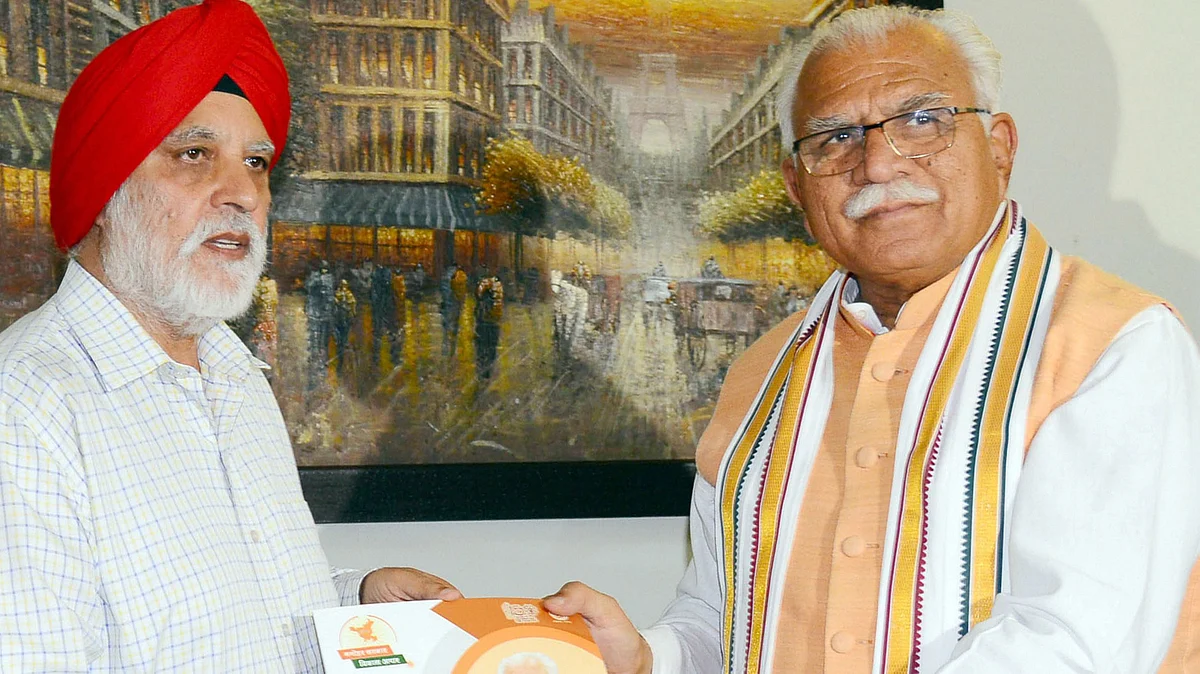 Haryana Chief Minister Manohar Lal with Justice (Retd) HS Bhalla.