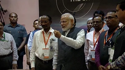 Bengaluru: Prime Minister Narendra Modi motivates scientists at ISRO Centre after communication was lost from Vikram Lander that was scheduled to land on the moon; in Bengaluru on Sep 7, 2019. (Photo: IANS/ISRO)