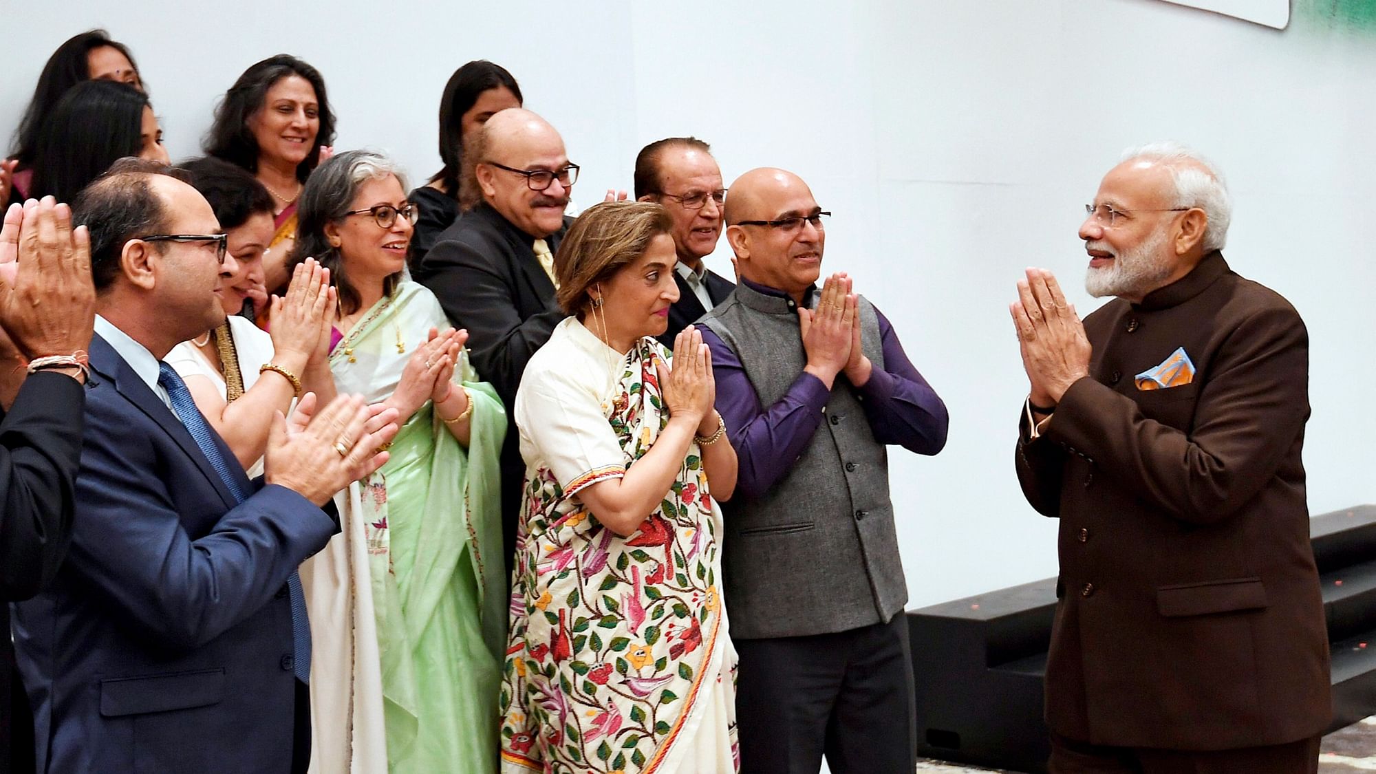 Prime Minister Narendra Modi exchanged greetings with a delegation of Kashmiri Pandits during an interaction with the Indian community in Houston.