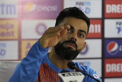 Dharamsala: Indian skipper Virat Kohli addresses a press conference on the eve of their first T20I match against South Africa, at Himachal Pradesh Cricket Association Stadium in Dharamsala on Sep 14, 2019. (Photo: Surjeet Yadav/IANS)
