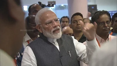 Bengaluru: Prime Minister Narendra Modi motivates scientists at ISRO Centre after communication was lost from Vikram Lander that was scheduled to land on the moon; in Bengaluru on Sep 7, 2019. (Photo: IANS/ISRO)