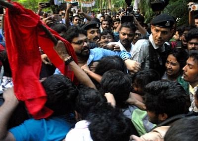 Kolkata: Union Minister Babul Supriyo heckled by a section of students of Jadavpur University during his visit to the campus to attend an event organised by the Akhil Bharatiya Vidyarthi Parishad (ABVP) in Kolkata on Sep 19, 2019. Several slogan-shouting pro-Left students surrounded Supriyo as soon as he arrived and asked him to leave. He was headed to the K.P. Basu Memorial Hall where a freshers