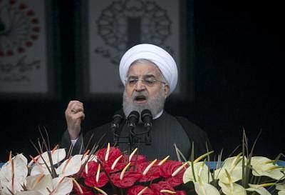 TEHRAN, Feb. 11, 2019 (Xinhua) -- Iranian President Hassan Rouhani speaks during a large gathering on the 40th anniversary of the Islamic Revolution at Azadi Square in Tehran, Iran, on Feb. 11, 2019. On Monday, hundreds of thousands of Iranians attended nationwide rallies to celebrate the 40th anniversary of the victory of the Islamic Revolution. (Xinhua/Ahmad Halabisaz/IANS)