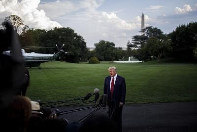 WASHINGTON D.C., Sept. 13, 2019 (Xinhua) -- U.S. President Donald Trump speaks to reporters before leaving the White House in Washington D.C. Sept. 12, 2019. Donald Trump said on Thursday that he will not ask Secretary of State Mike Pompeo to assume a dual role of being his fourth national security advisor after the ouster of John Bolton. (Photo by Ting Shen/Xinhua/IANS)
