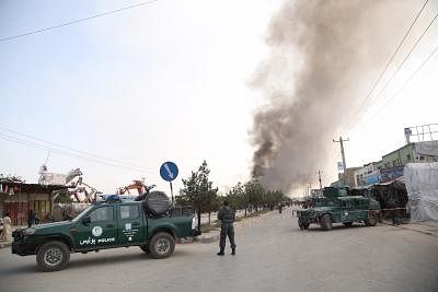 KABUL, Sept. 3, 2019 (Xinhua) -- Members of Afghan security forces stand guard near the site of a tractor bomb attack in Kabul, capital of Afghanistan, Sept. 3, 2019. The death toll from a massive tractor bomb explosion in Afghanistan